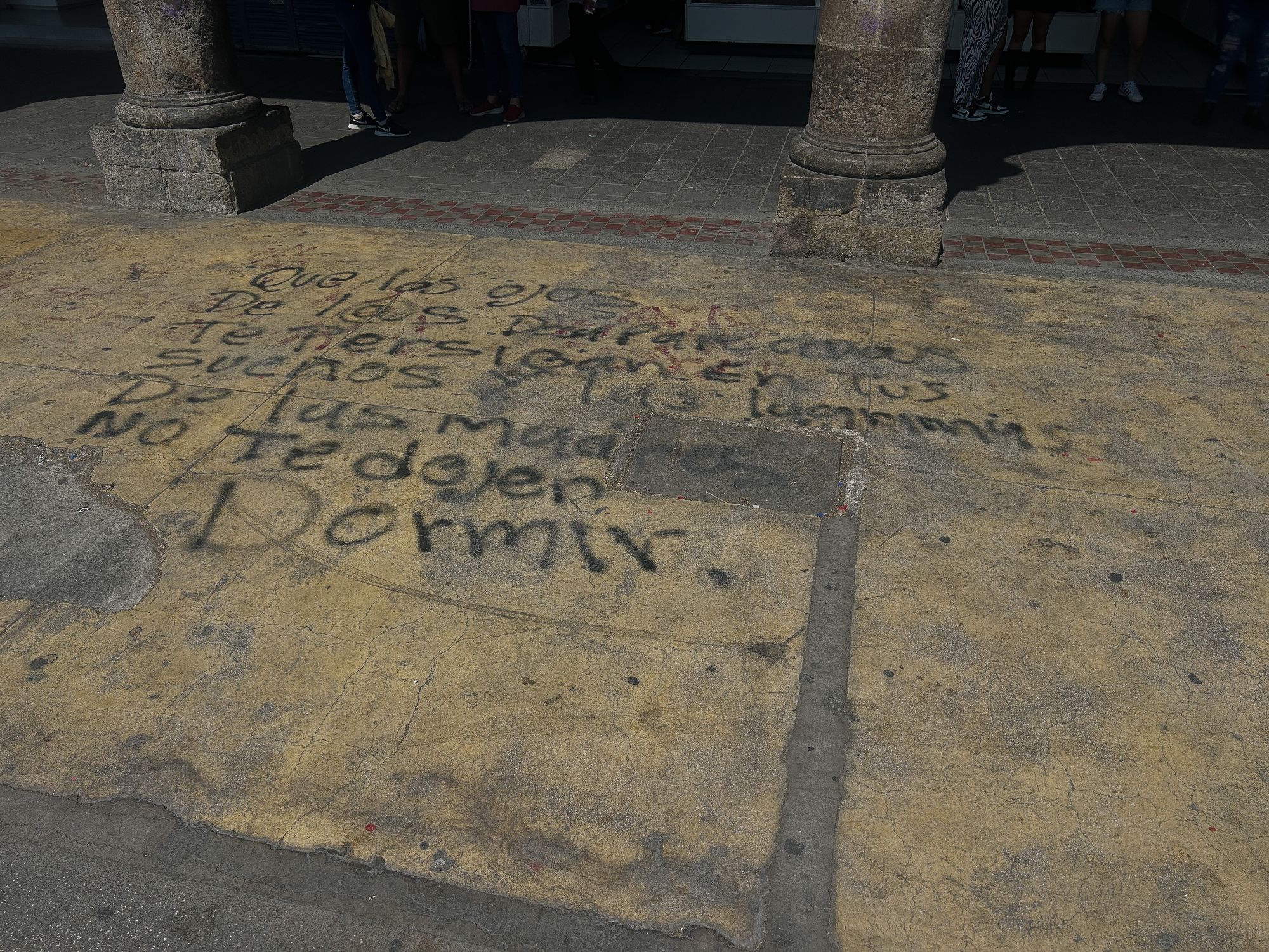 Handwritten message on the pavement in Guadalajara